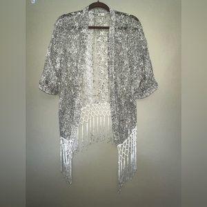 Hollister cardigan fringed bottom  three quarter sleeve size small/ XSMALL